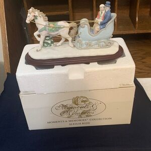 Avon Holiday Sleigh Ride Figurine - White and Blue
